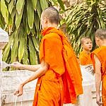 Buddhists Monks at Work in Luang Prabang, Laos