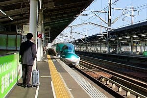 Bullet Train Arriving in a Station in Japan