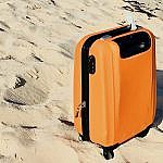 Hand Luggage on Beach