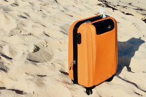 Hand Luggage on Beach