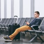 Passenger waiting to fly inside airport terminal