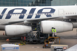 Finnair engineer carries out maintenance work on plane