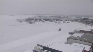 Snow covers the runway