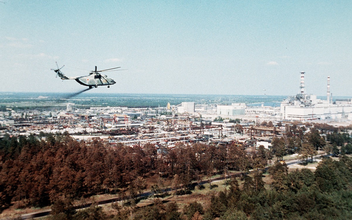 Helicopter carrying neutralising chemicals over the Chernobyl exclusion zone
