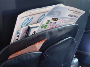 Inflight magazine stored in seat pocket holders