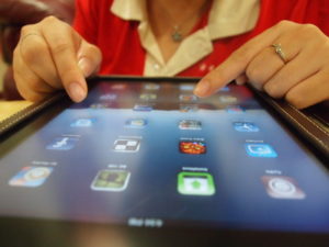 Image of woman using a tablet