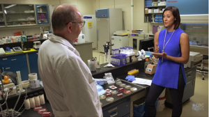CBC inside a lab with Microbiologist discussing the pathogens found.
