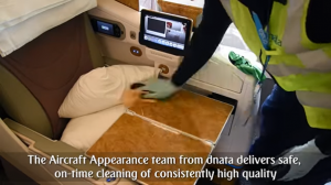 Emirates crew cleaning high-touch surfaces
