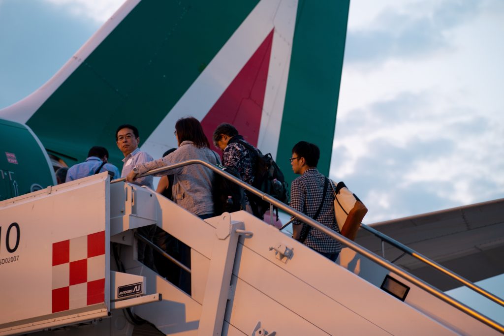 Passengers boarding an Alitalia flight. Photo by Marcel Pirnay