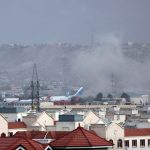 Smoke rises from Kabul Airport after a large explosion at the Abbey Gate following several western agencies reporting a terrorist threat just hours earlier