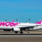swoop plane on runway