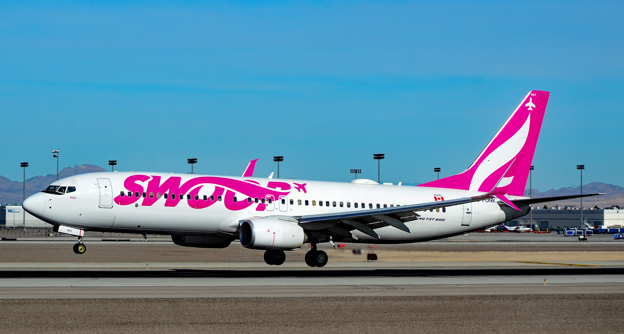 swoop plane on runway
