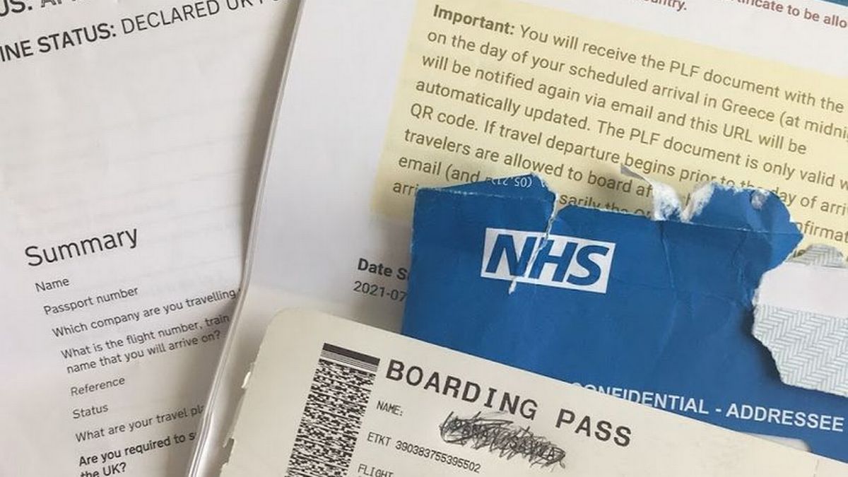 NHS envelope PLF form and boarding pass