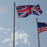 US and UK flags flying