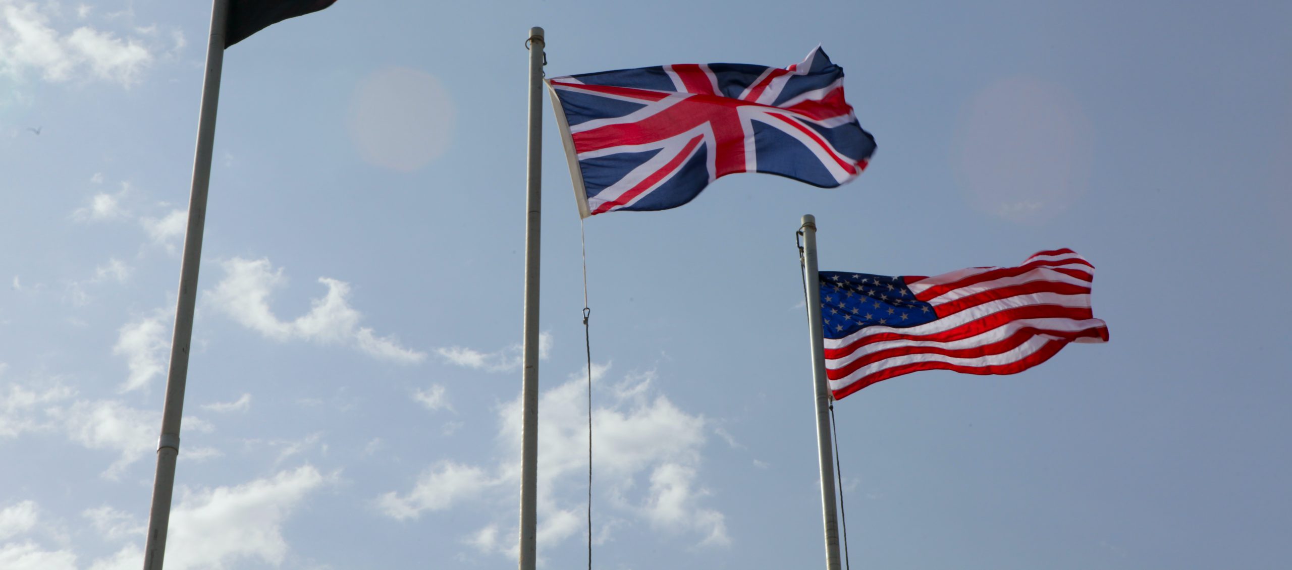 US and UK flags flying