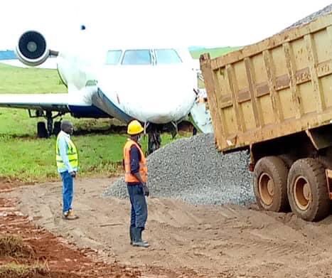 Rwandair flight being saved from the mud at entebbe airport uganda