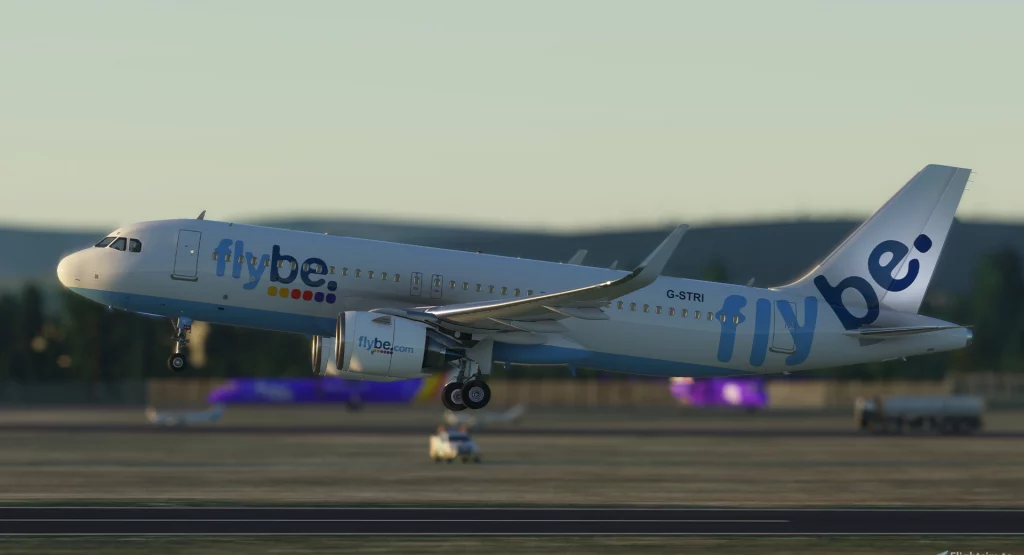Flybe old livery plane taking off