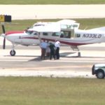 Passenger lands plane