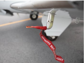 An image of a covered pitot tube of an aircraft | Aviation Safety