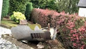 Atlanta Icelandic Boeing 747-400F's engine fell from the plane and damaged a garage roof.