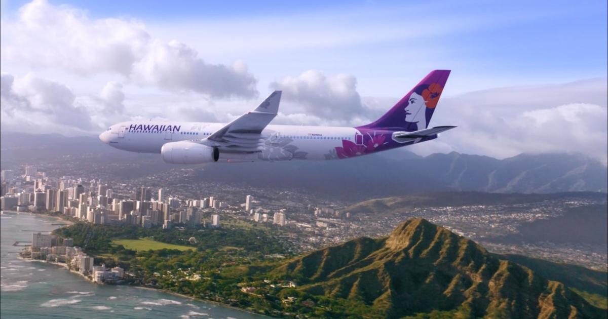 A Hawaiian Airlines Airbus A330 Diamondhead flying over hills