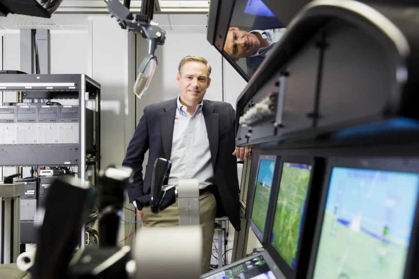 Kelly Ortberg, then CEO of Rockwell Collins, at the company's production facility in in Manchester, Iowa, in 2016. Boeing has tapped Ortberg to be its new CEO, effective next month