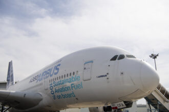 Airbus A380 close up showing 100% sustainable aviation fuel onboard logo