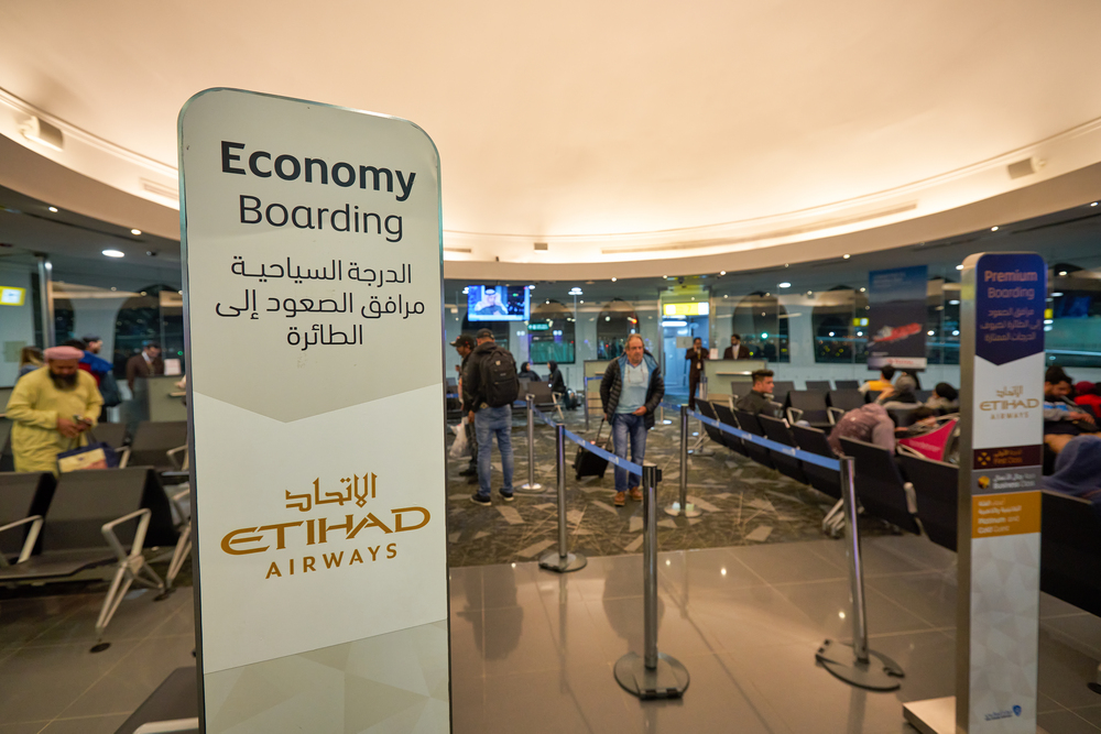 ABU DHABI, UAE - CIRCA JANUARY, 2020: boarding sign seen in Abu Dhabi International Airport. 
