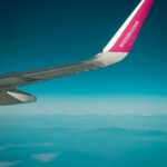 Wing of Wizzair plane taken from the plane when flying
