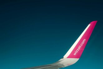 Wing of Wizzair plane taken from the plane when flying