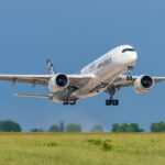 Airbus taking off against a blue sky