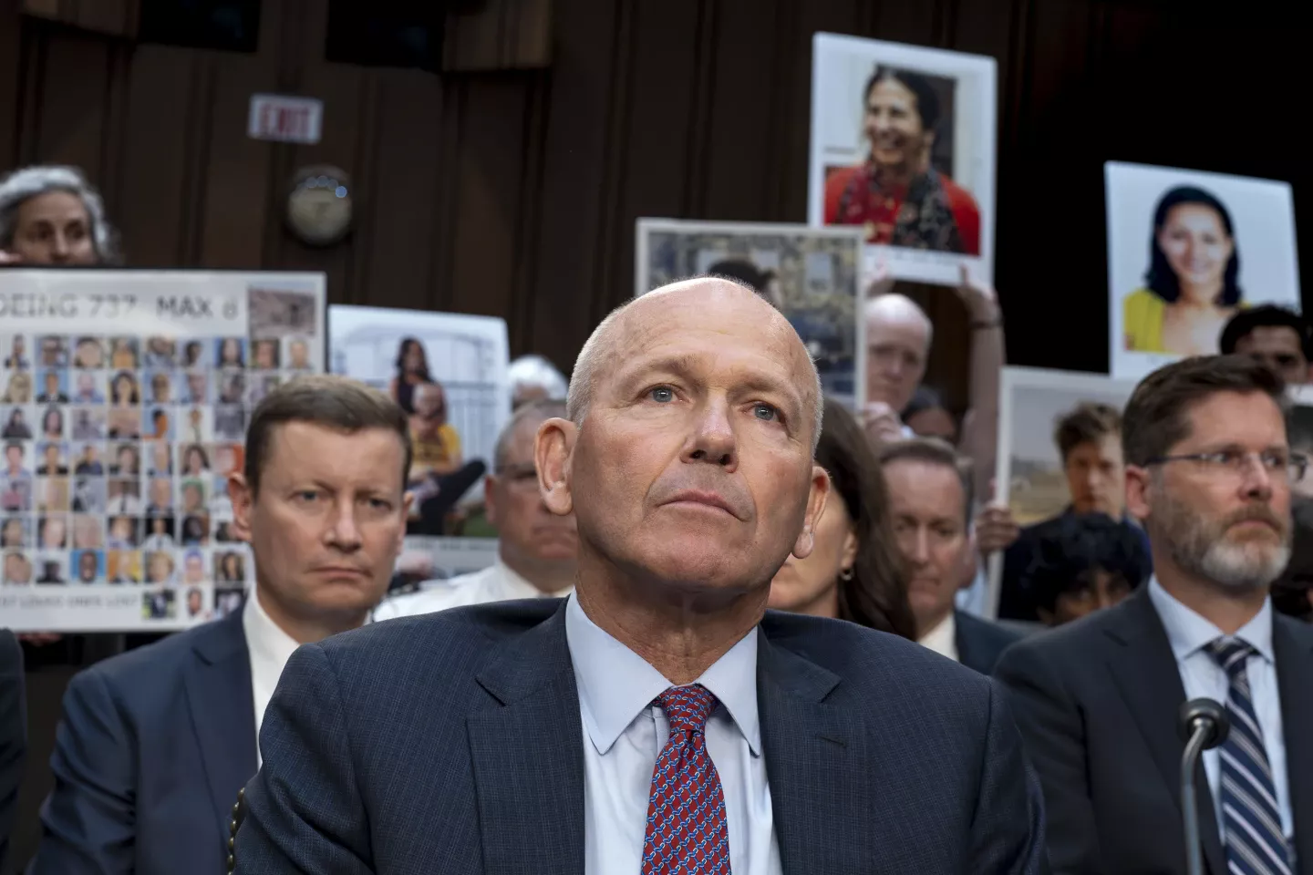 Former Boeing CEO Dave Calhoun waits to testify at the Capitol in Washington