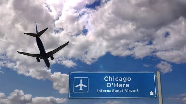 The image of Chicago O'Hare International Airport sign against a flying plane in the sky.