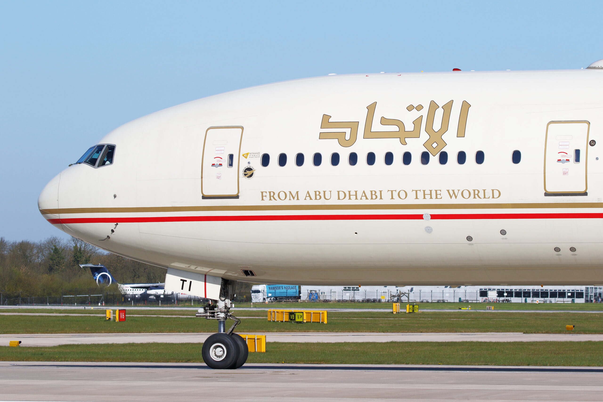 Etihad Airways Plane showling slogan 'From Abu Dhabi to the world'