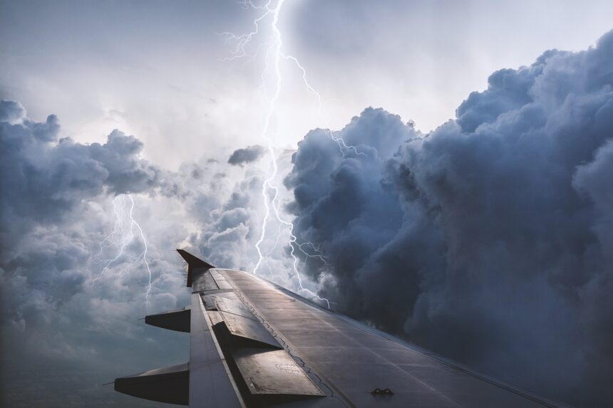 The image of a view from a flying plane during weather conditions.