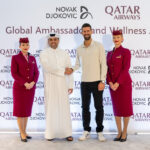 Photograoh of Novak Djokovic shaking hands with Qatar Airways CEO