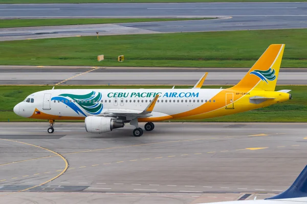 The image of Cebu Pacific Air Airbus A320 airplane at Changi airport (SIN) in Singapore.