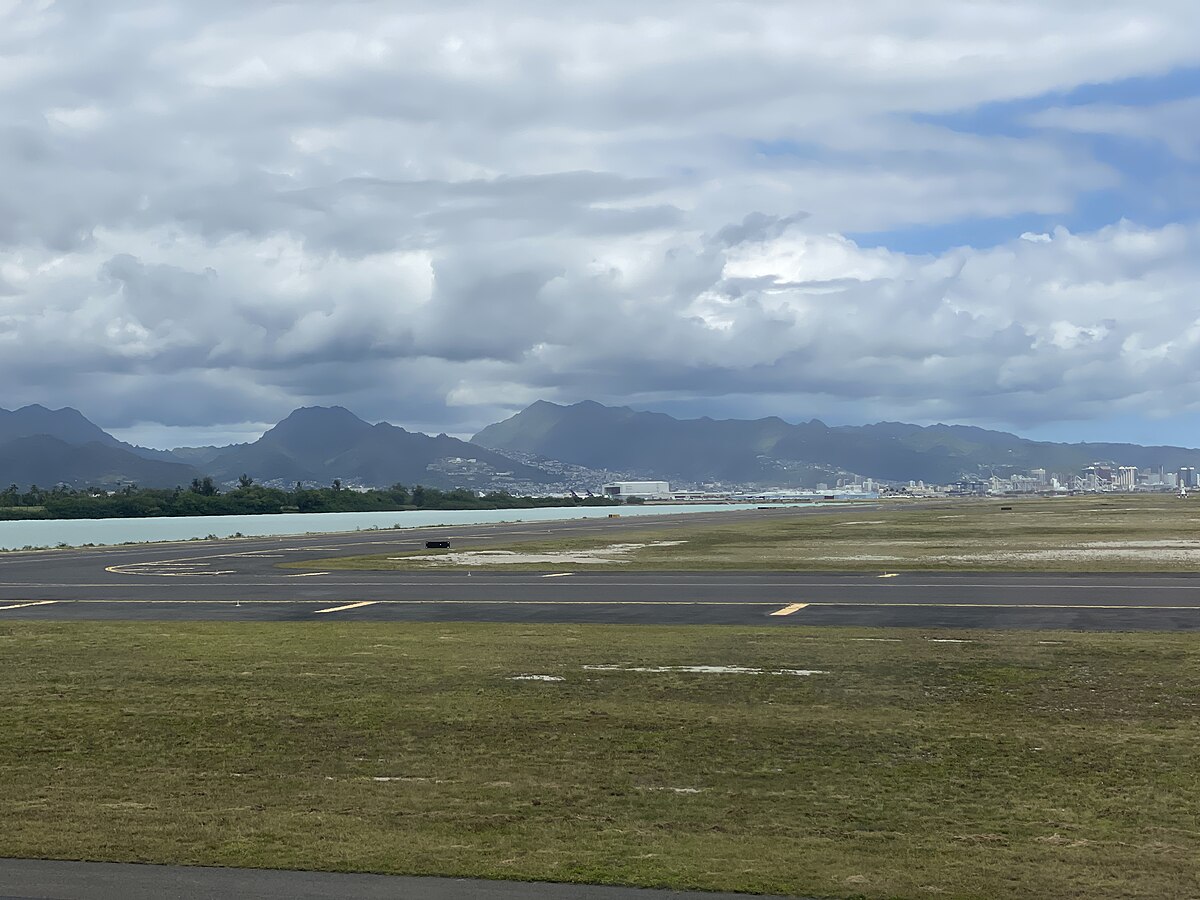 Honolulu International Airport overlooking the Ko'olau Mountain Range.