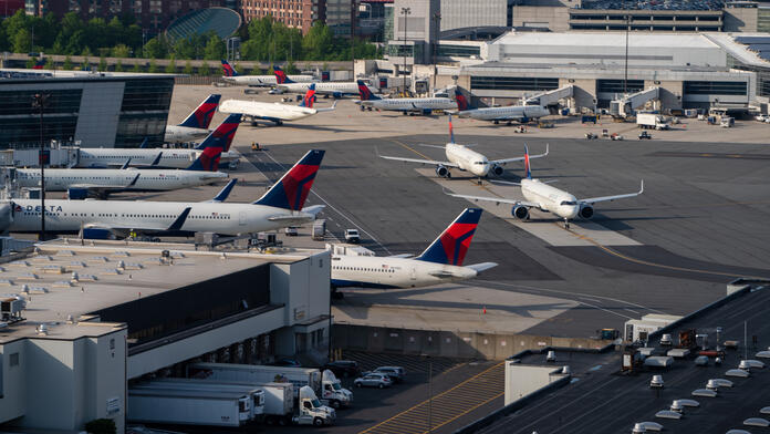Delta planes sit on the tarmac of Boston Logan International Airport 