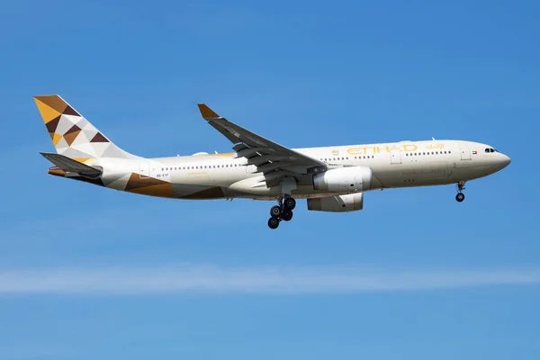 The image of Etihad Airways Airbus A330-200 passenger plane arrival and landing.