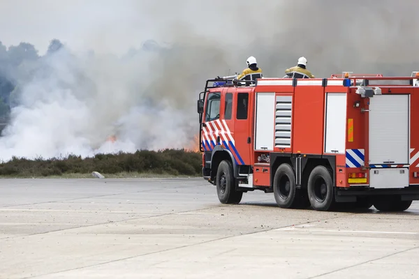 The image of a firetruck is moving the fire.