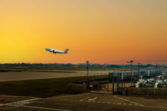 A airplane taking off from London Airport by Quintin Geller