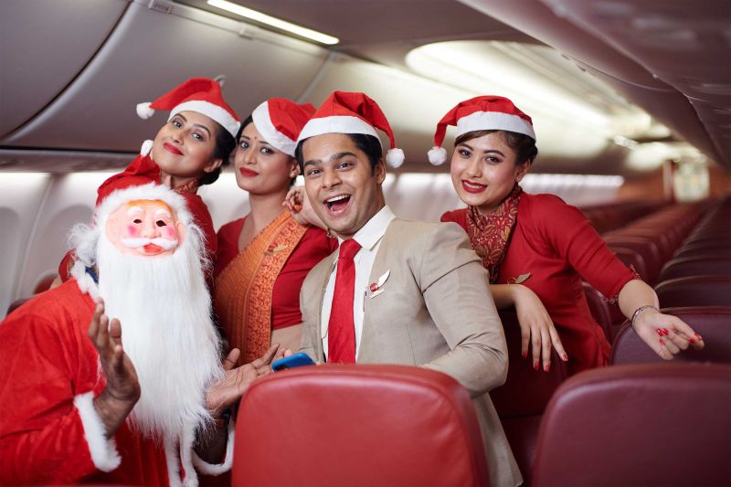 An in-flight celebration of christmas by the Air India crew