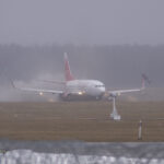 An airplane amid fog-related travel chaos