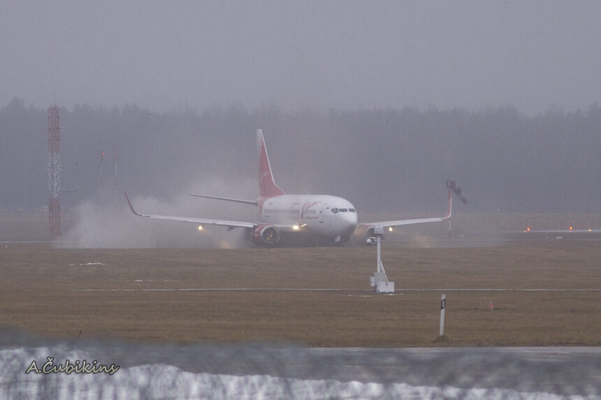 An airplane amid fog-related travel chaos