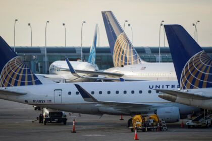 United Airlines planes are parked at their gates at O'Hare International Airport in Chicago, Illinois, U.S., November 20, 2021.