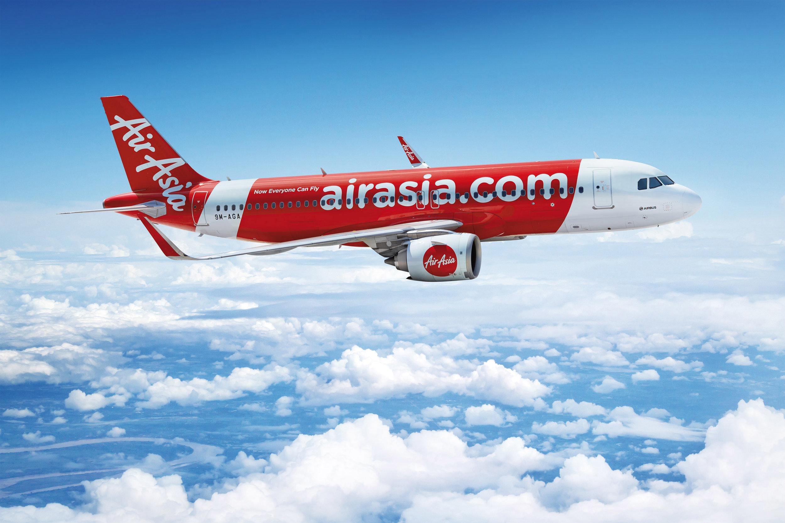The A320neo seen mid flight in AirAsia colors 