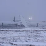 Air Canada Flight 2259 stationary on the runway after an emergency landing.