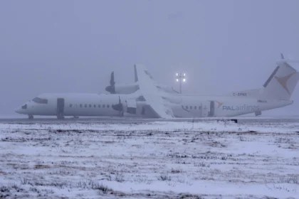 Air Canada Flight 2259 stationary on the runway after an emergency landing.