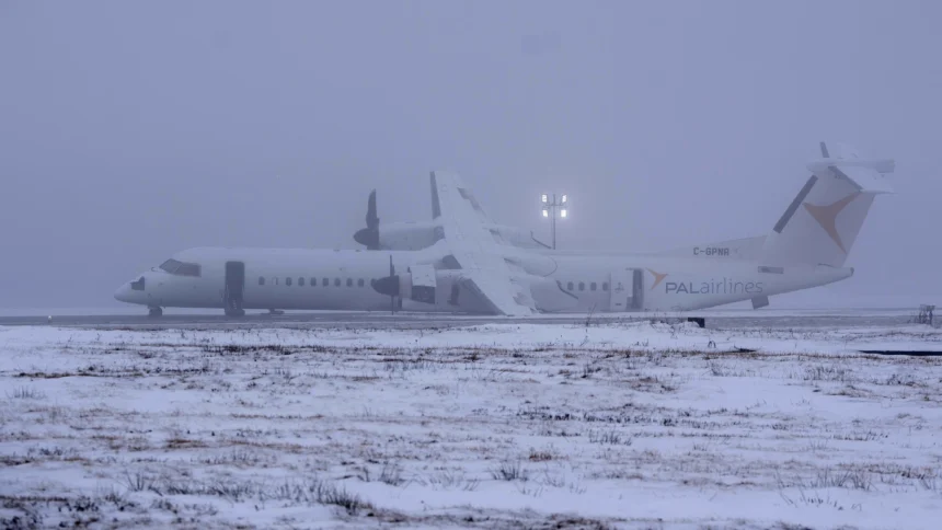 Air Canada Flight 2259 stationary on the runway after an emergency landing.